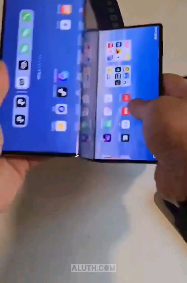 Showing the Huawei Mate XT. It is the size of 3 phones and can be folded into 2 other display sizes.