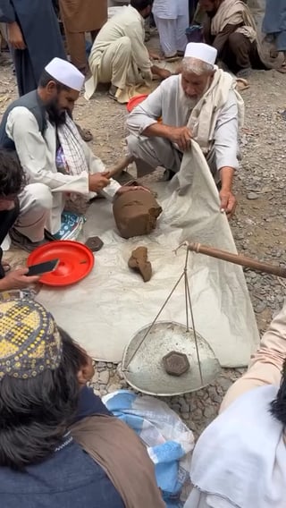 Tirah Valley farmer chopping and selling his hash