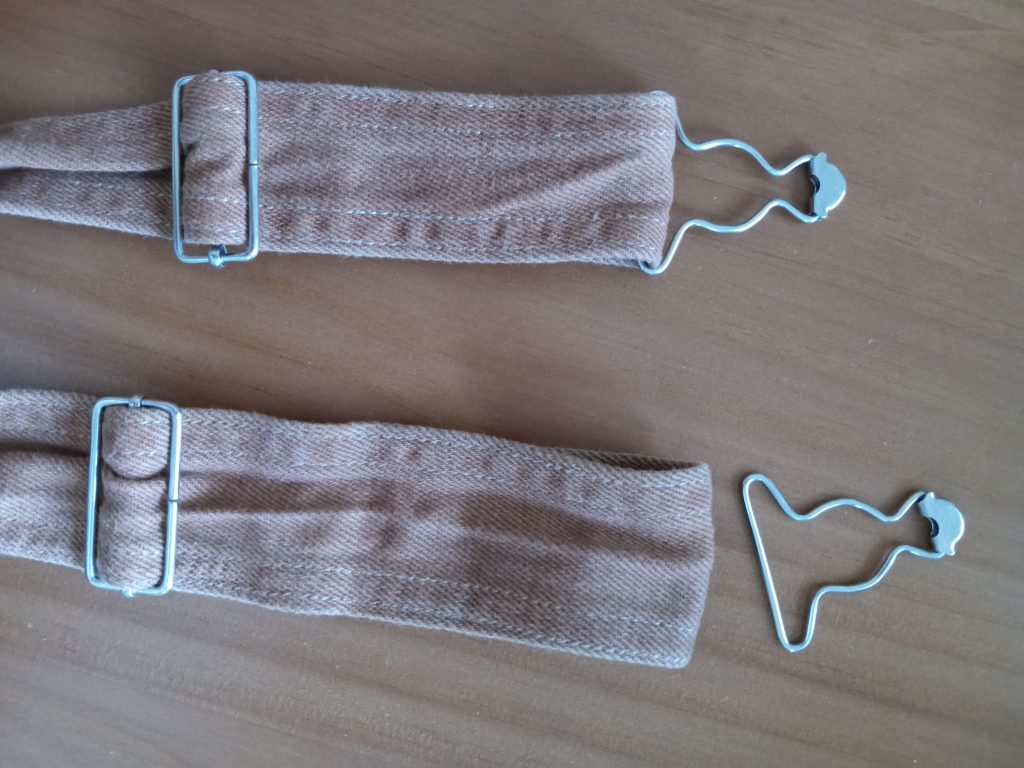 Overalls clip came off in the dryer somehow. Both loops fully intact and closed.