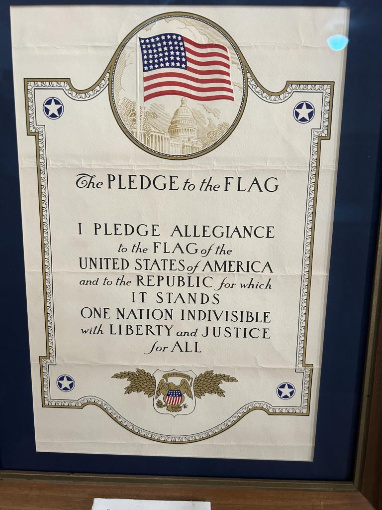 This pledge of allegiance in a one-room schoolhouse museum from the early 1900’s