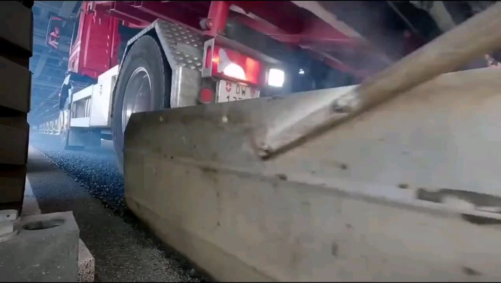 Switzerland uses a mobile overpass bridge to carry out road work without stopping traffic.