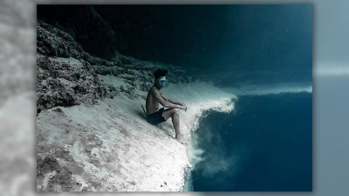 Real Pic of Man Sitting on Edge of ‘Underwater Cliff’?