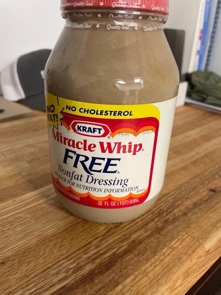 Almost 30 year old sealed Miracle whip I use as a paper weight.