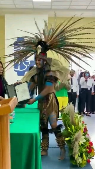 Engineering student decided to receive his degree with ceremonial indigenous attire.