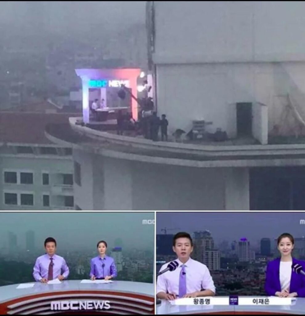 A Korean news program actually filming on the top of the building instead of using a green screen.