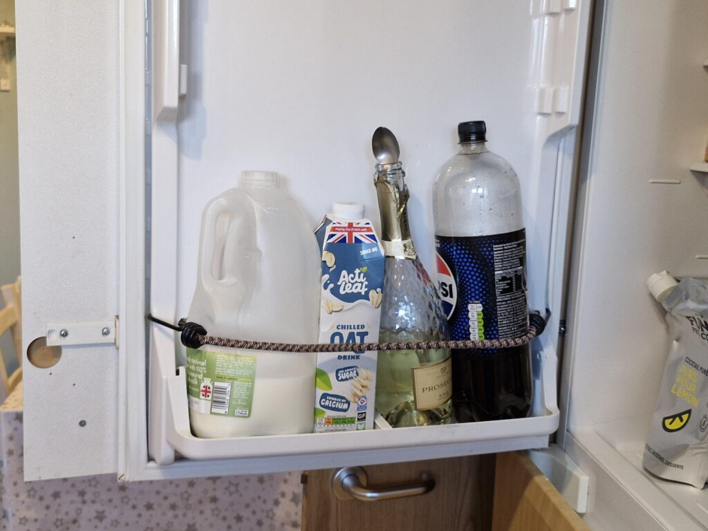 My dad used some climbing rope as a temporary fix for the fridge. This rope has been in here for 15 years.