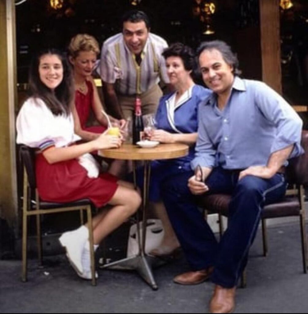 14yo Celine Dion sits across from future husband 39yo Rene Angélil in 1982