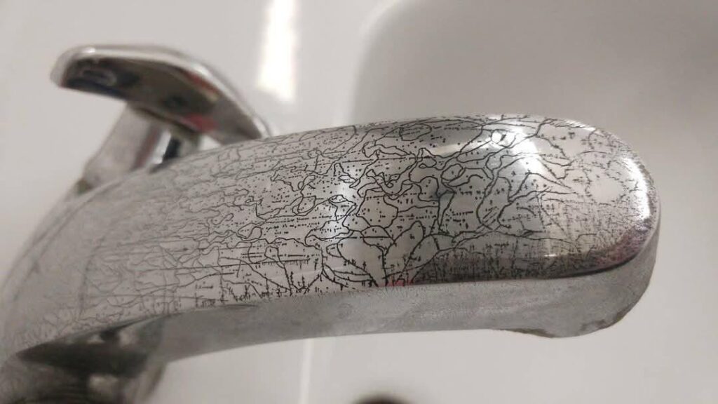 The corrosion on this faucet looks like a map